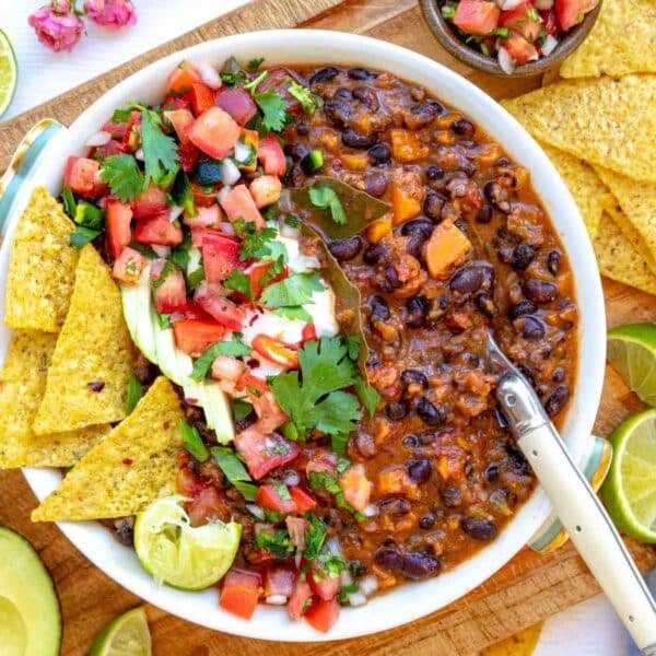 Black bean soup in a white bowl as a healthy soup meal.