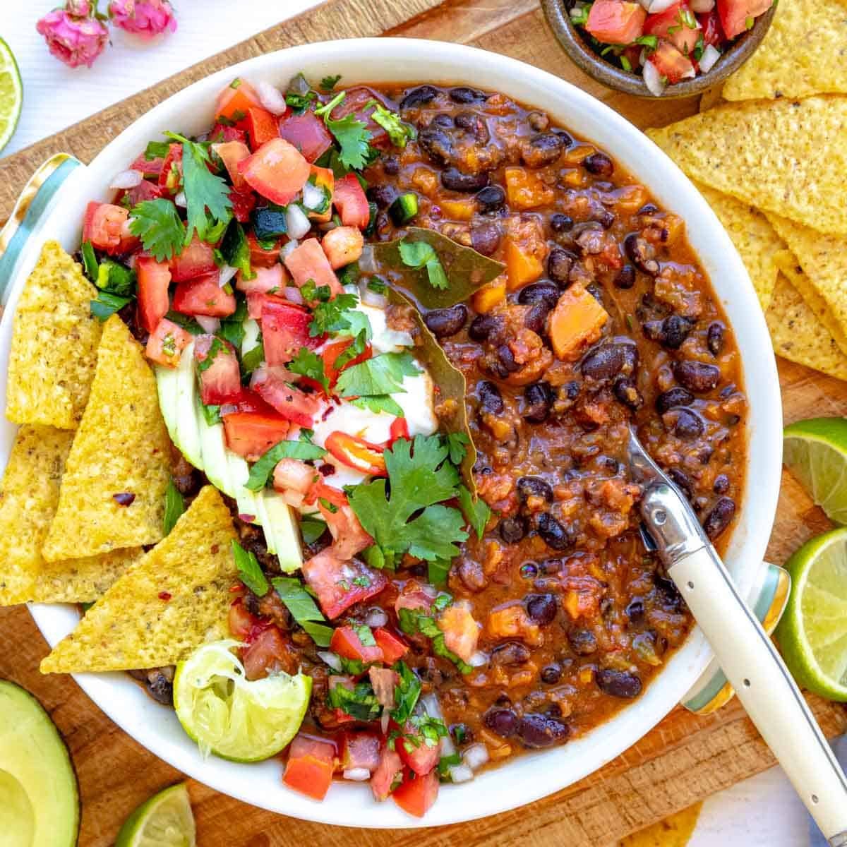 Black bean soup in a white bowl as a healthy soup meal.