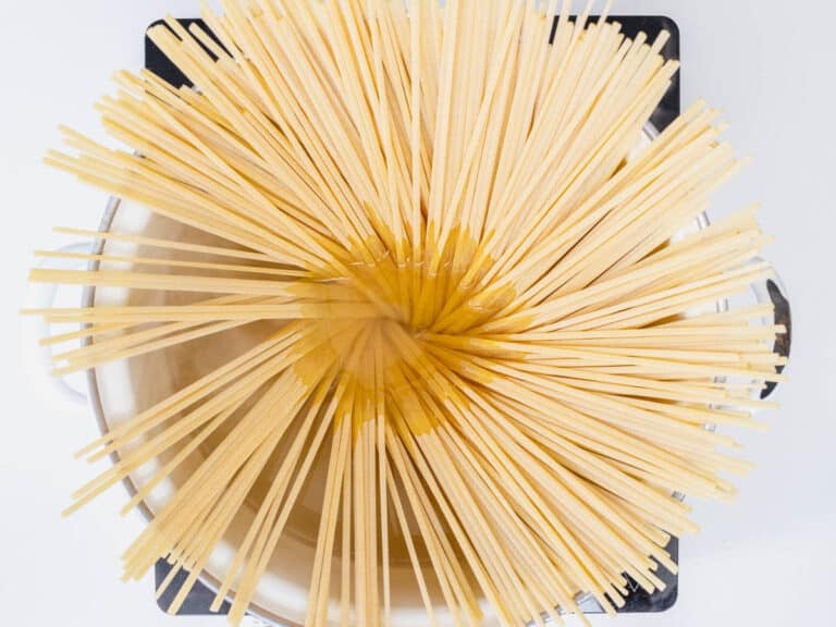 Spaghetti cooking in a pot