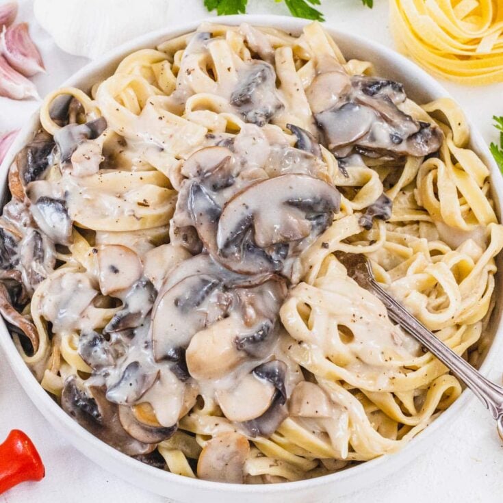 Mushroom Alfredo with a fork