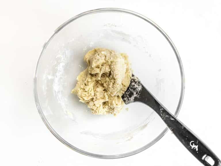 pie crust ingredients in a bowl with spatula