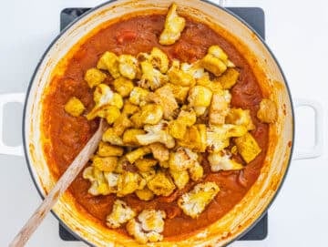 vegan curry ingredients with canned tomatoes