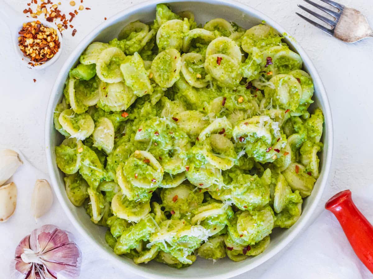 Broccoli pasta with mashed broccoli and a silver fork