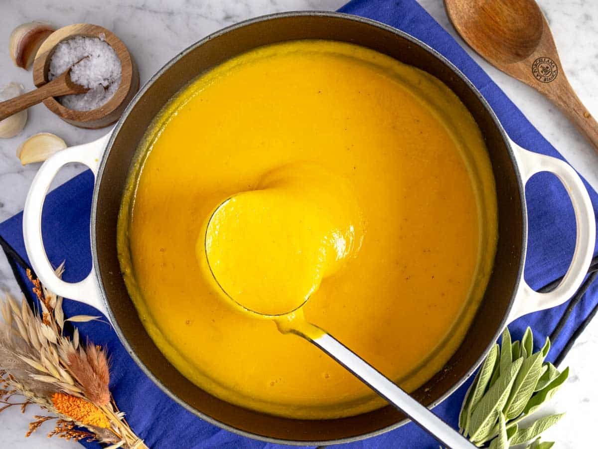 creamy butternut squash soup in a Dutch oven.