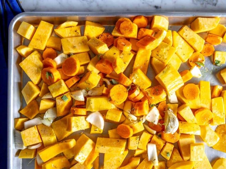 chopped vegetables on a baking tray