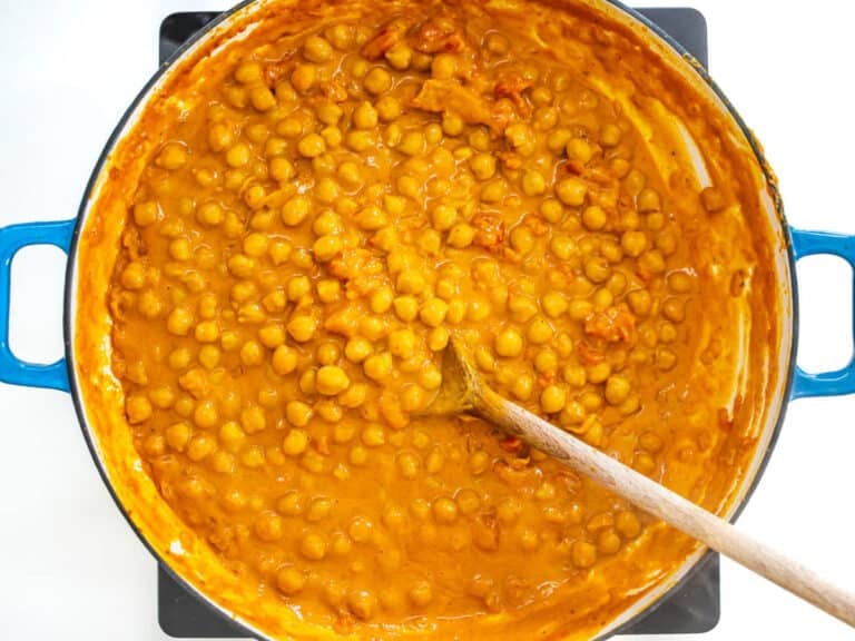 Creamy Chickpea Curry and a wooden spoon