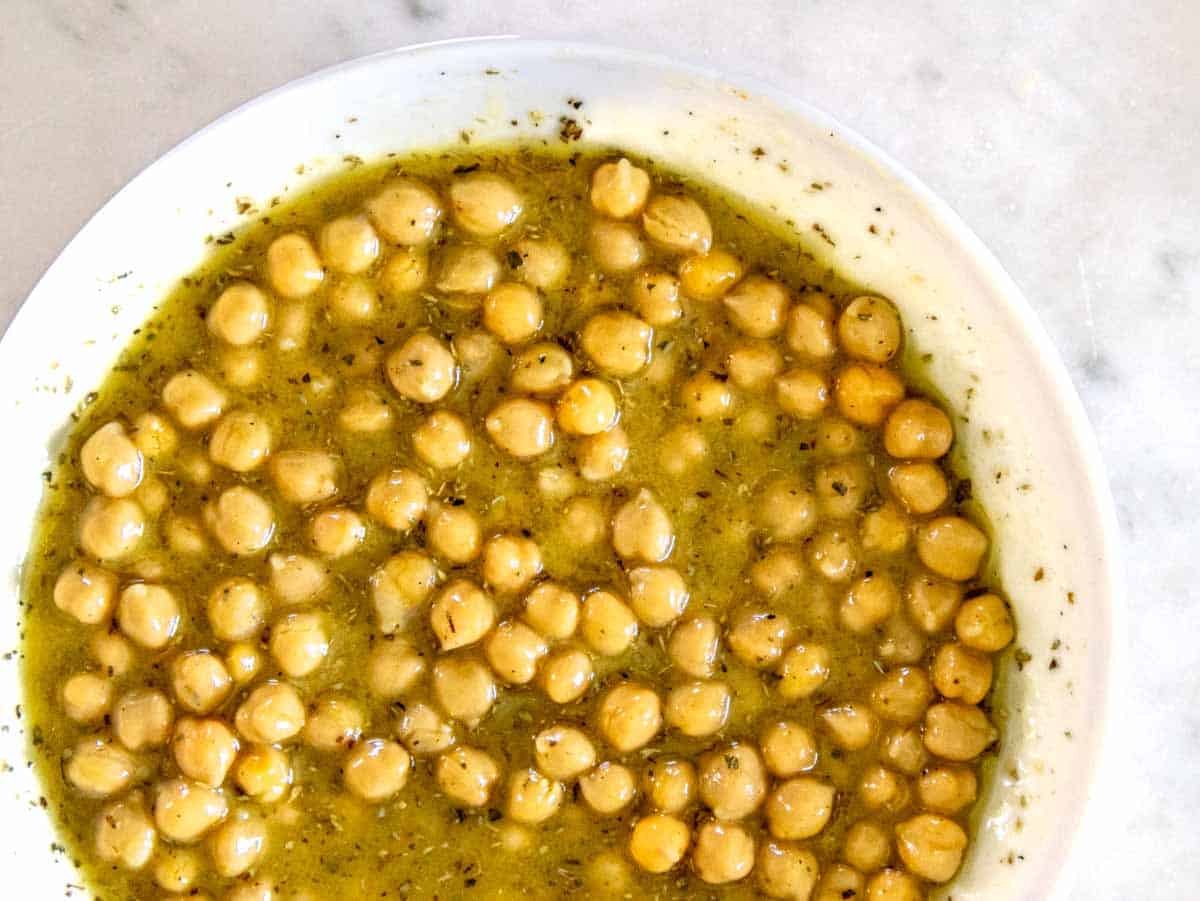 chickpeas marinating in a honey mustard dressing