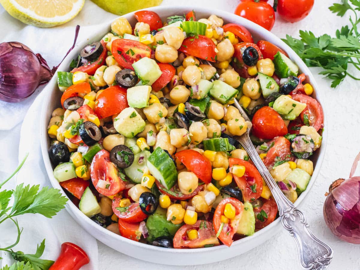 Chickpea salad with a silver fork