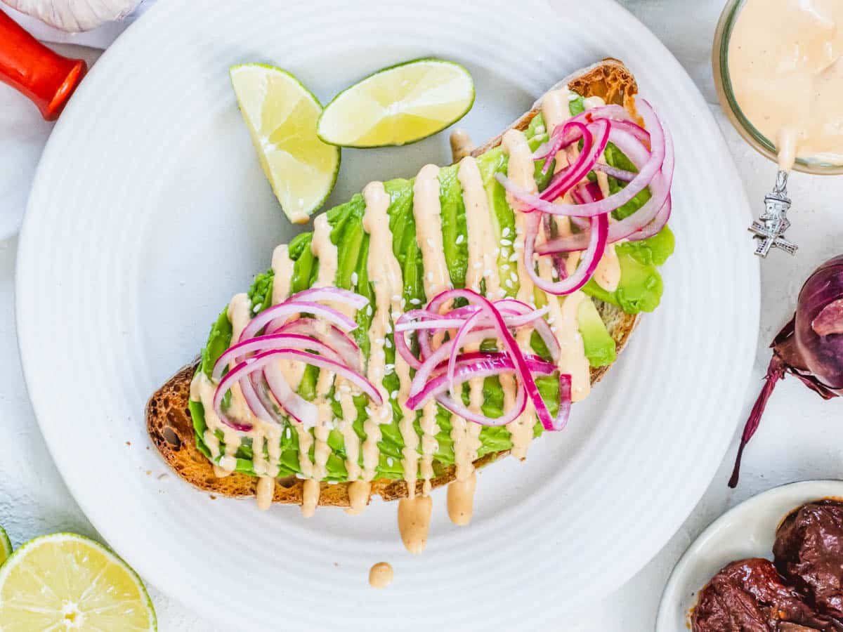 Pickled red onions on avocado toast