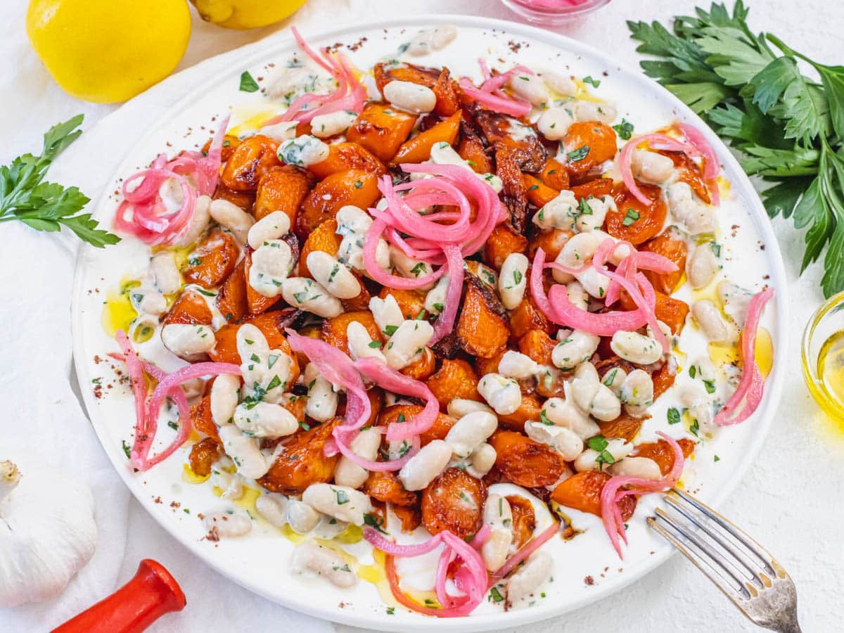 Roasted carrots on yogurt with pickled red onions