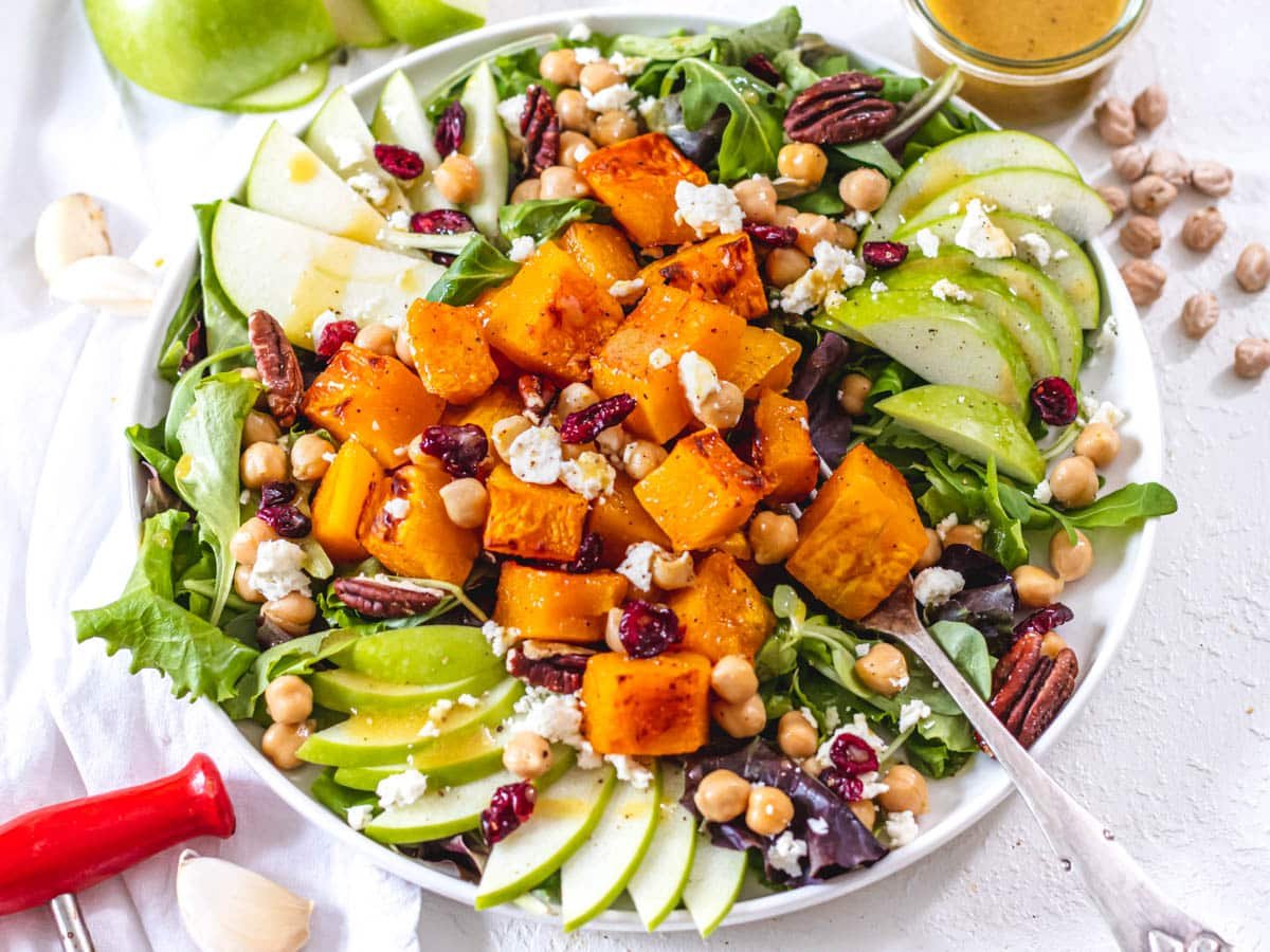 butternut squash salad on a white plate
