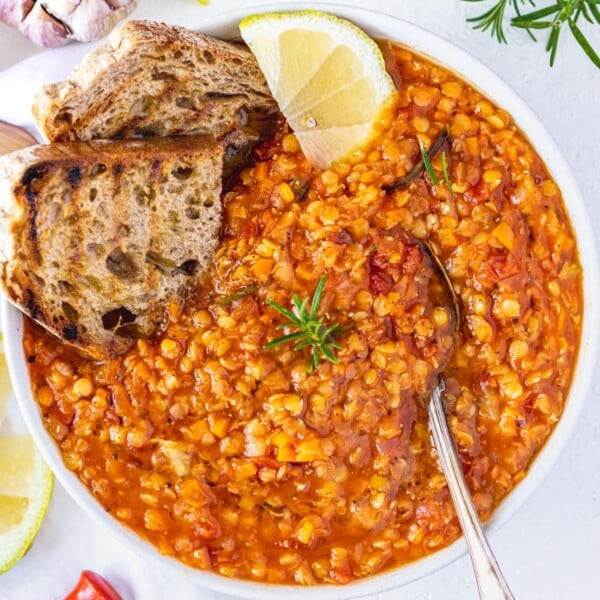 Red lentil soup with grilled bread and lemon
