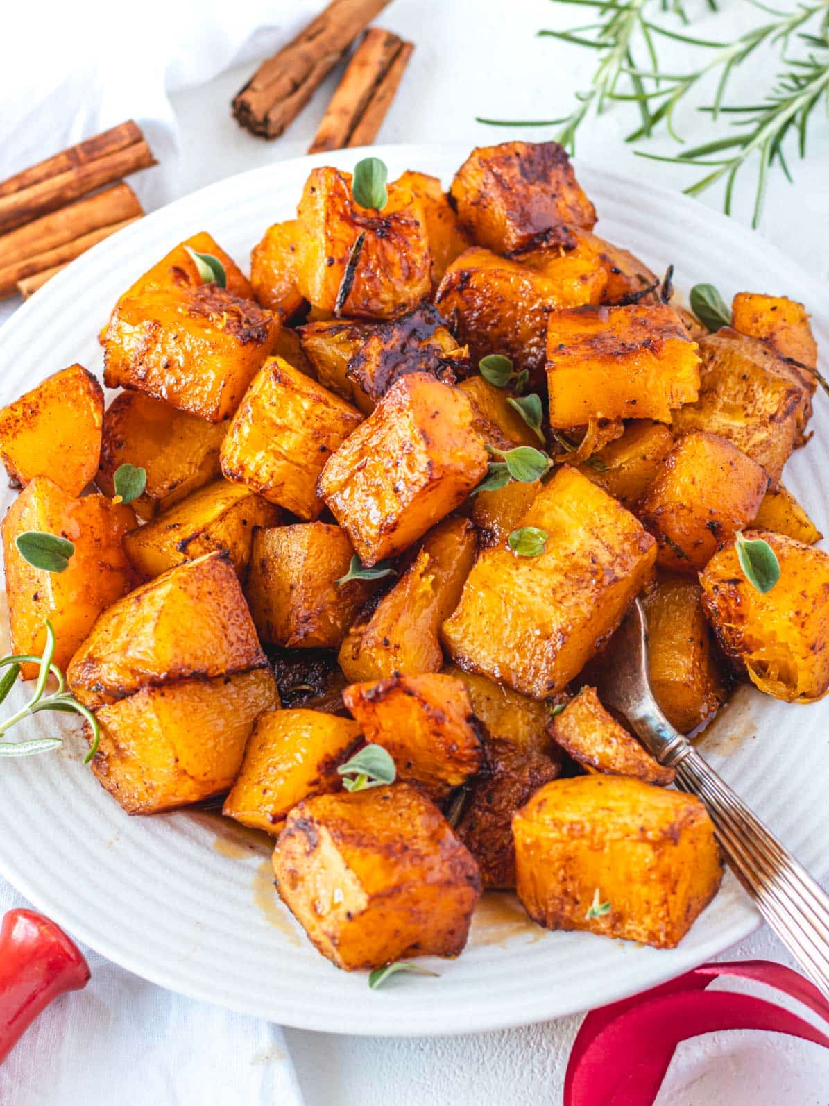 Roasted butternut squash cubes on a plate