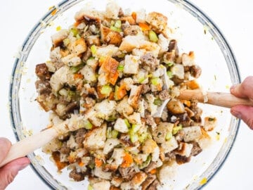 hands mixing breadcrumbs and flavor base in a bowl