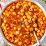 Comforting bowl of Italian pasta with chickpeas on a simple table setting.