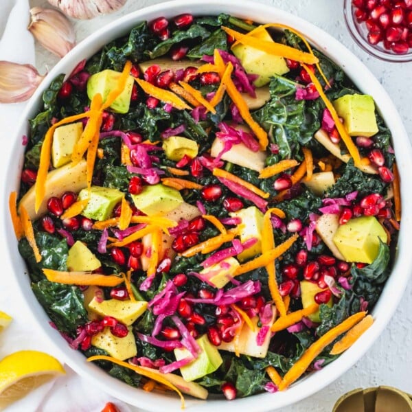 Kale salad in a white bowl