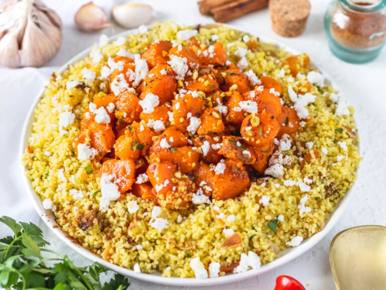 Moroccan couscous with roasted carrots and feta on top