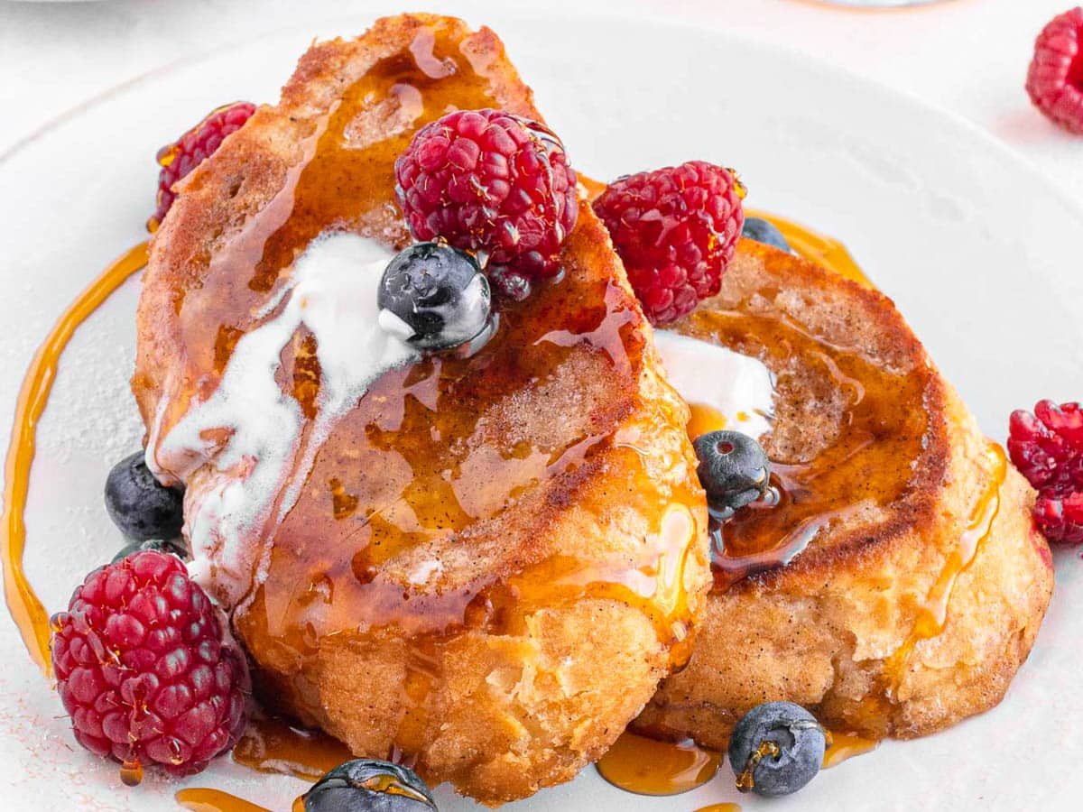 Vegan French toast with vegan butter, berries and maple syrup