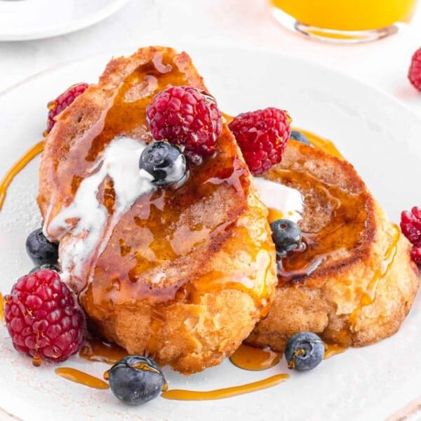 Vegan French toast with berries and maple syrup