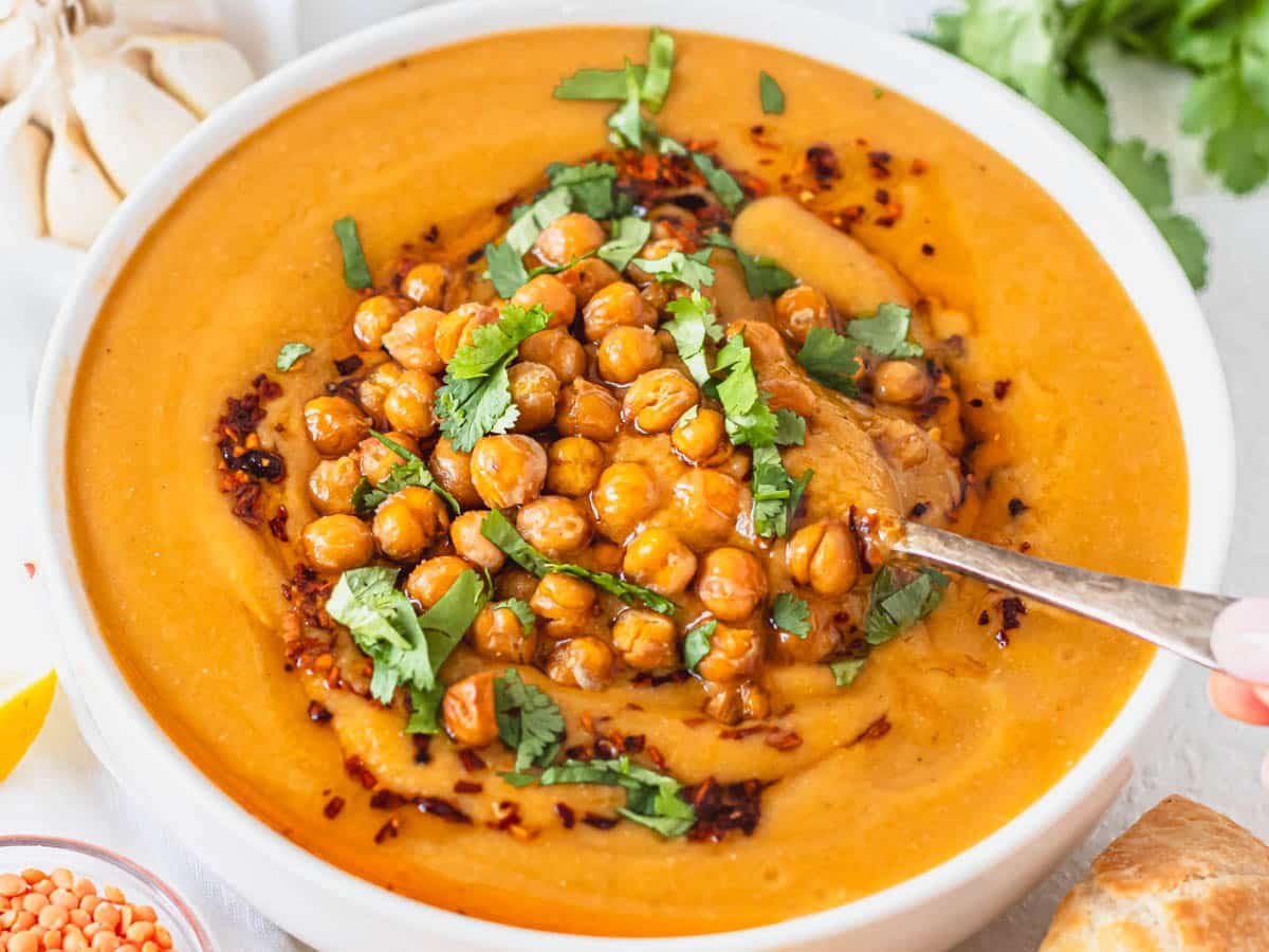 Turkish red lentil soup with roasted chickpeas, chili oil and fresh parsley