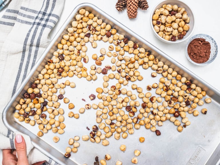 toasted hazelnuts on a silver tray
