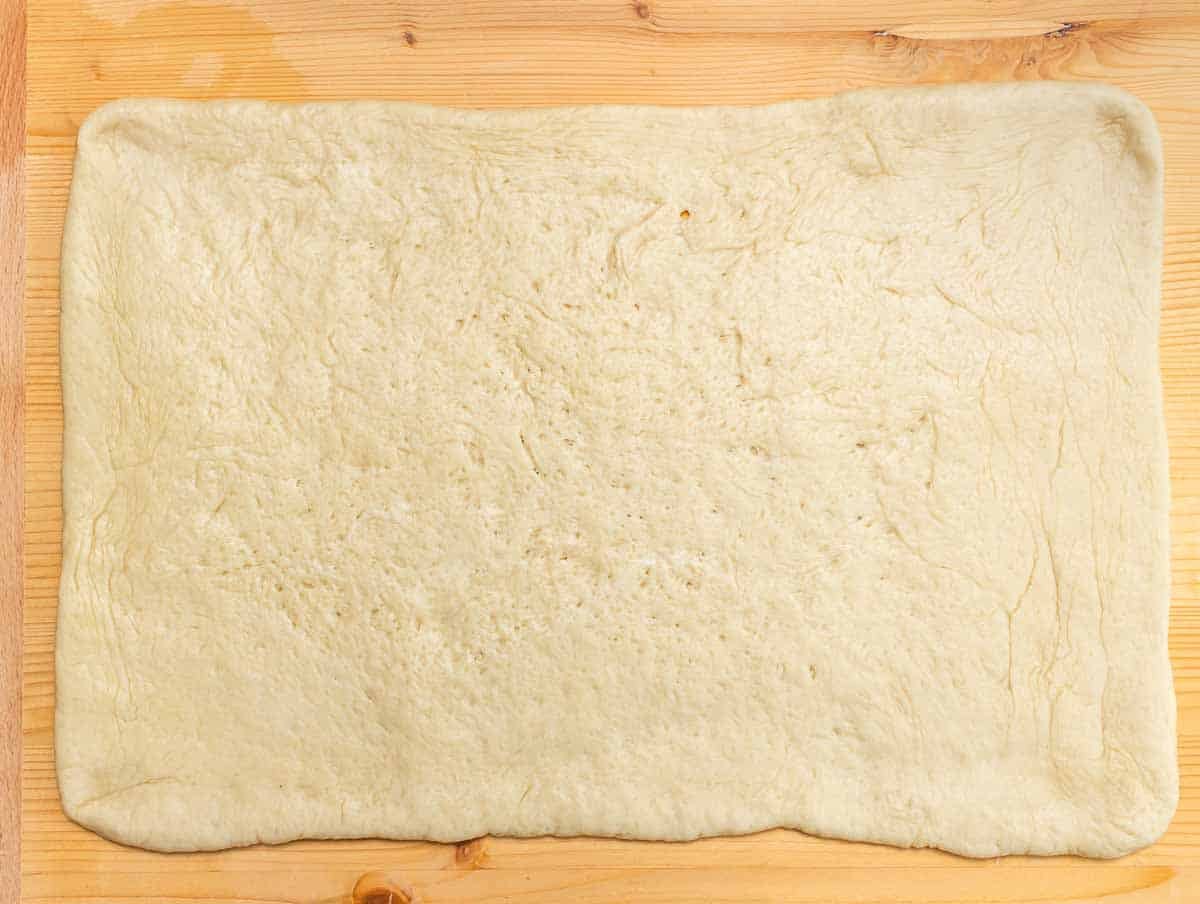 dough rolled out on worktop