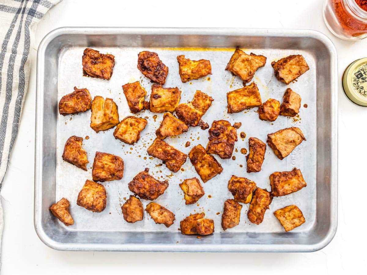 baked tofu pieces covered in marinade