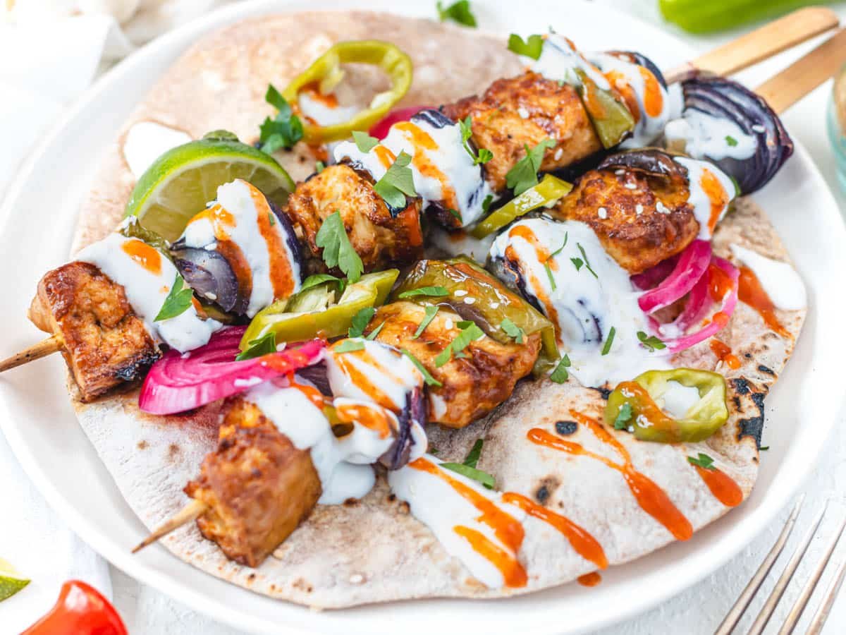 Baked Tofu skewers with ranch dressing and hot sauce