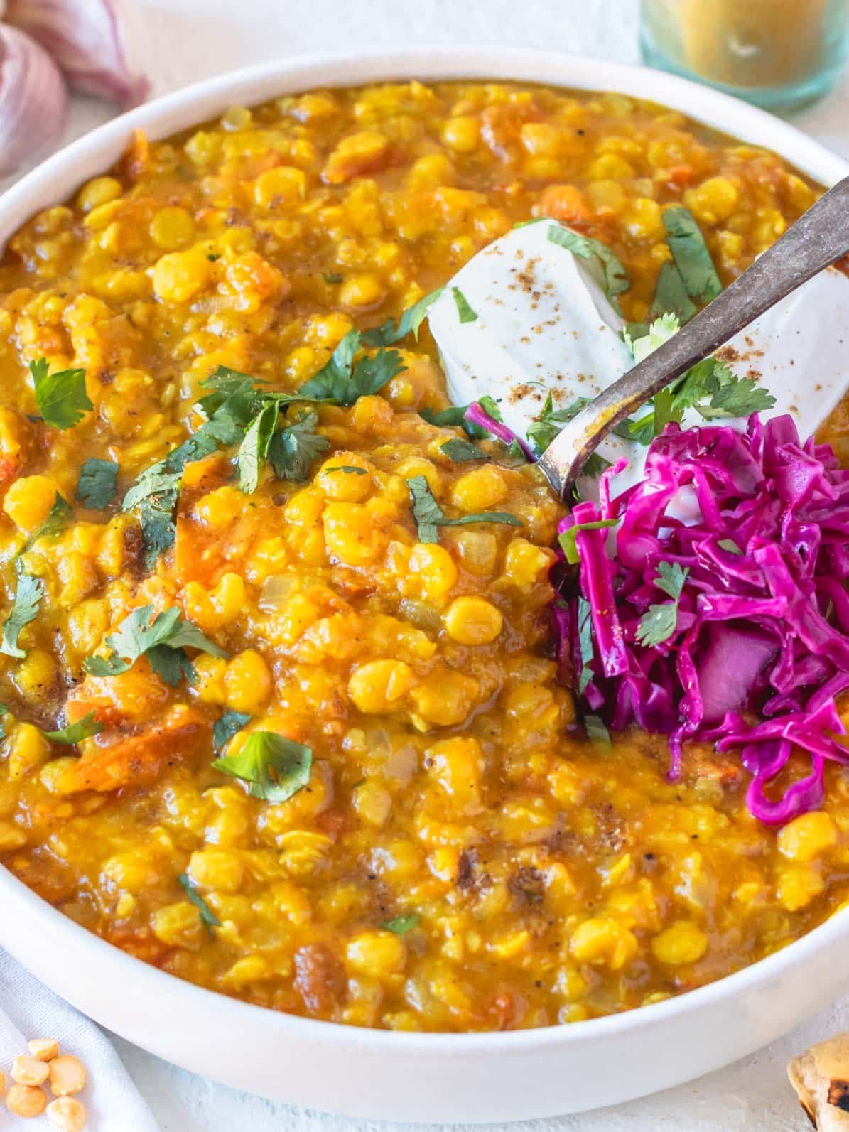 Chana Dal with split chickpeas, yogurt, and pickled red cabbage