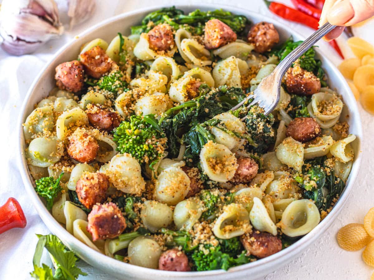 orecchiette with a silver fork and homemade breadcrumb topping