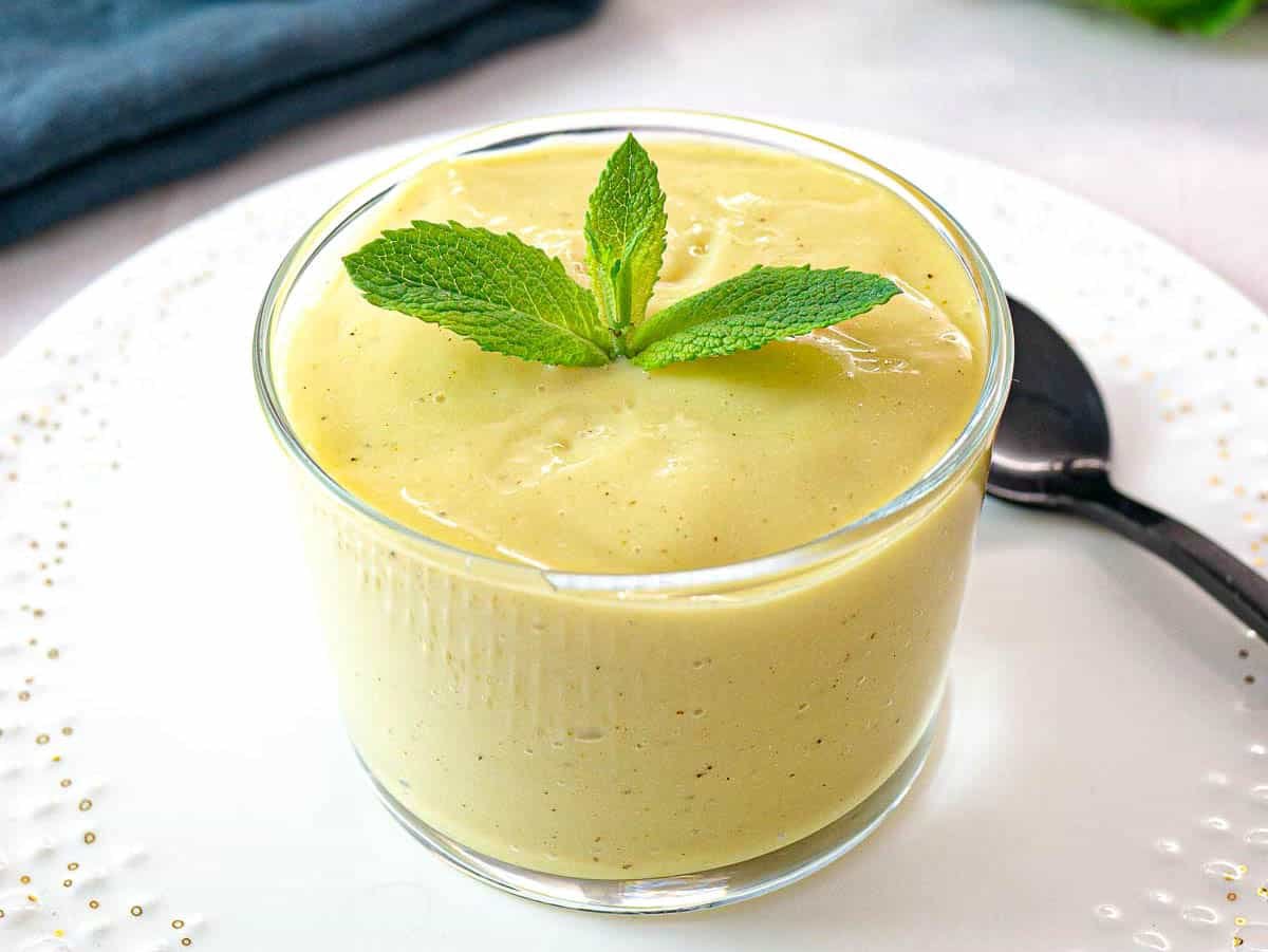 egg-free custard in a glass with fresh mint