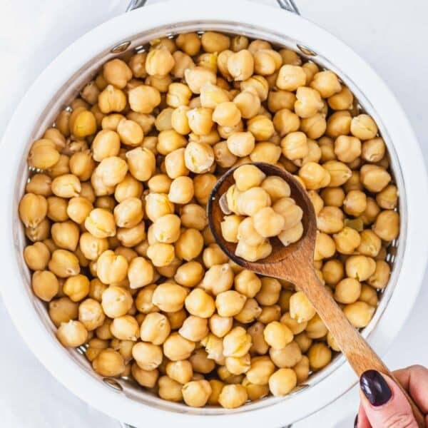 Cooked chickpeas in a strainer