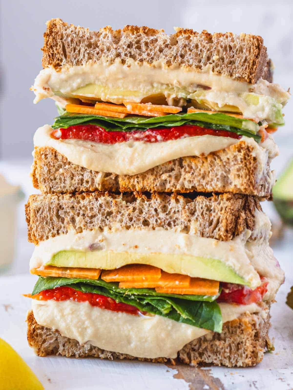 Hummus sandwich with spinach and carrot