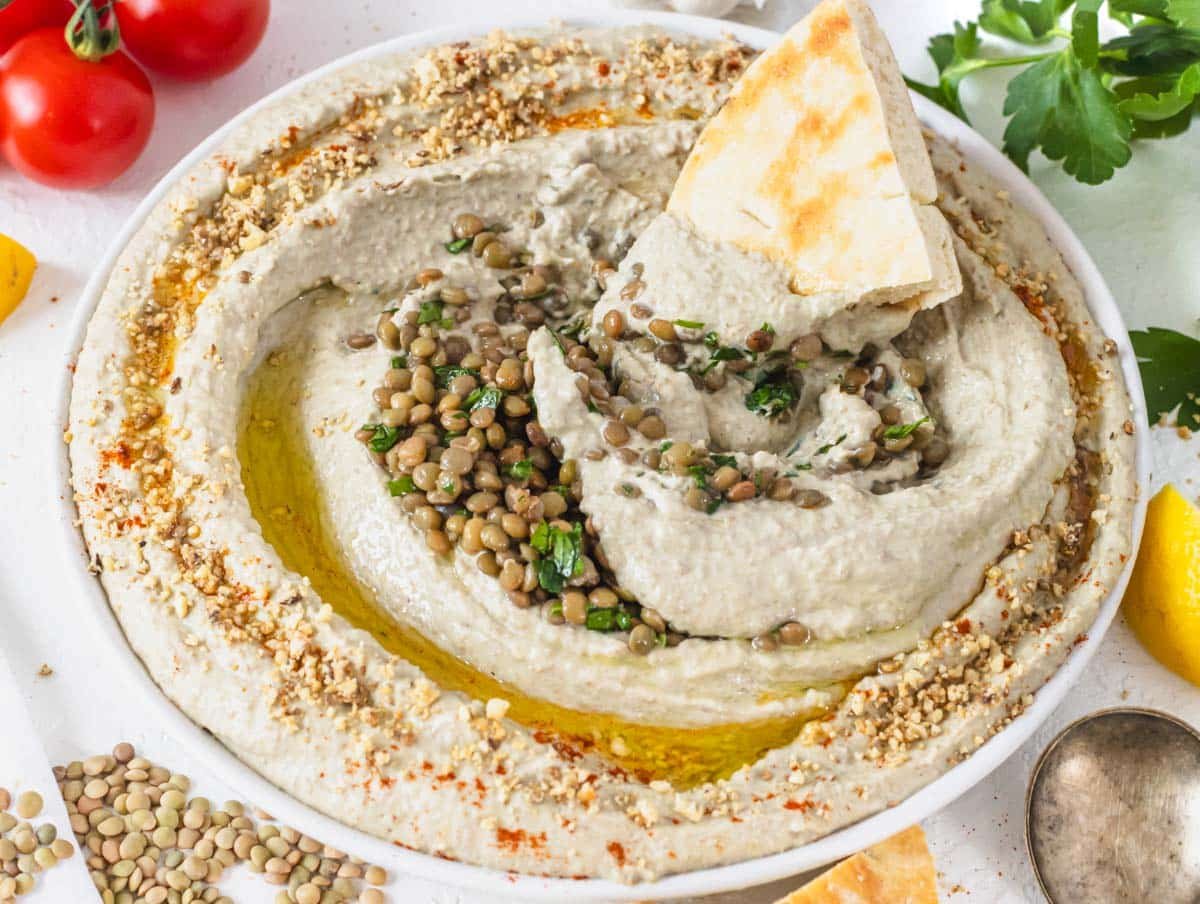 Lentil hummus with pita bread and fresh parsley