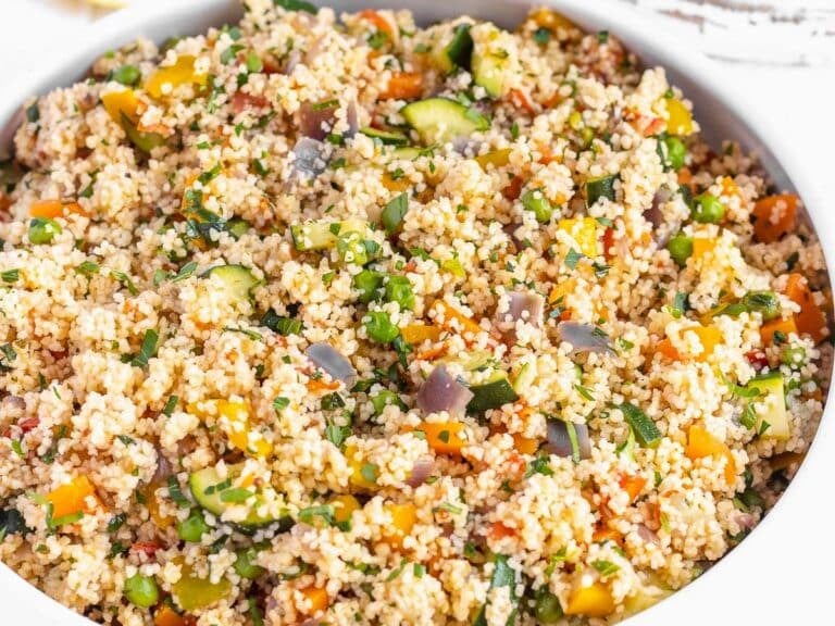 vegetable couscous with peas, zucchini and parsley