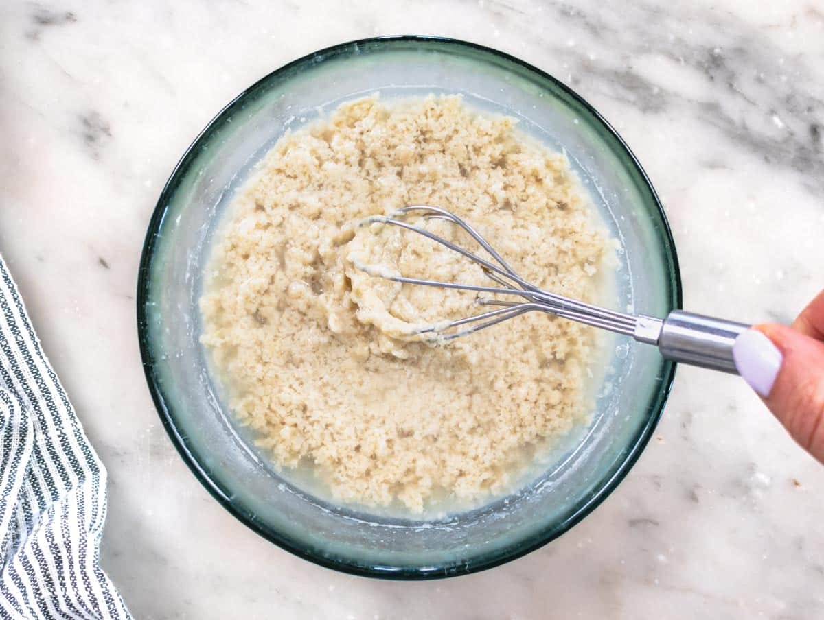 tahini and water in a glass bowl