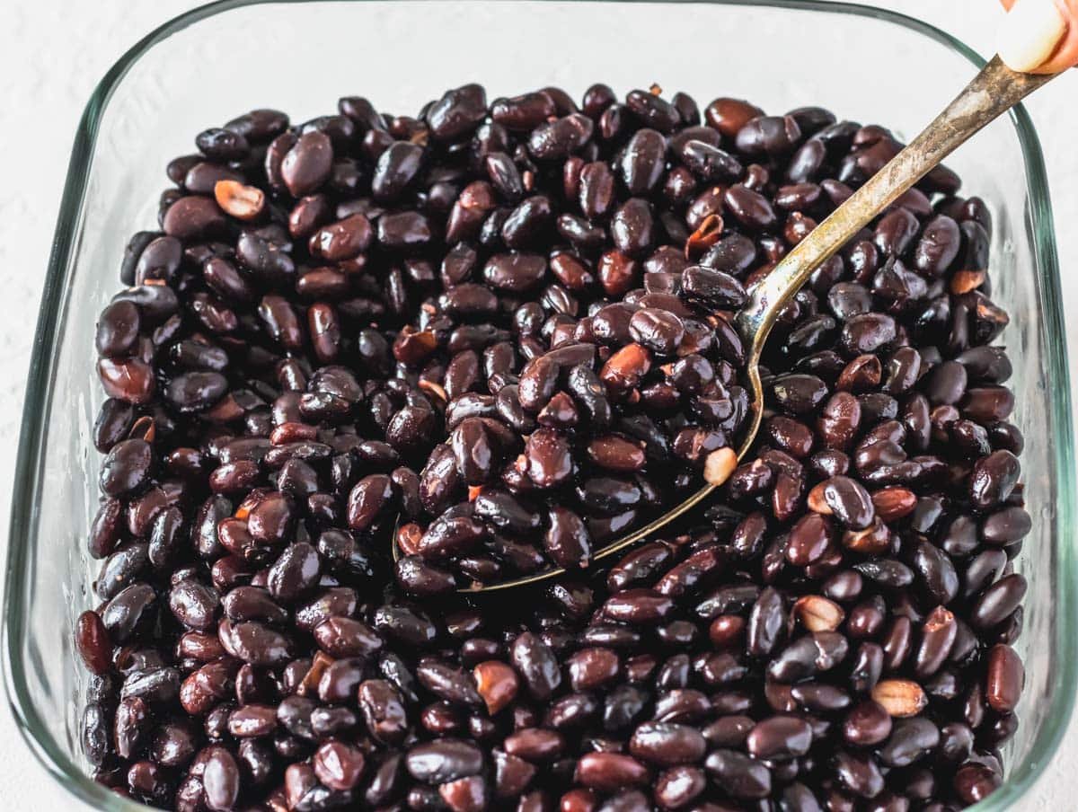 black beans stored in a glass container