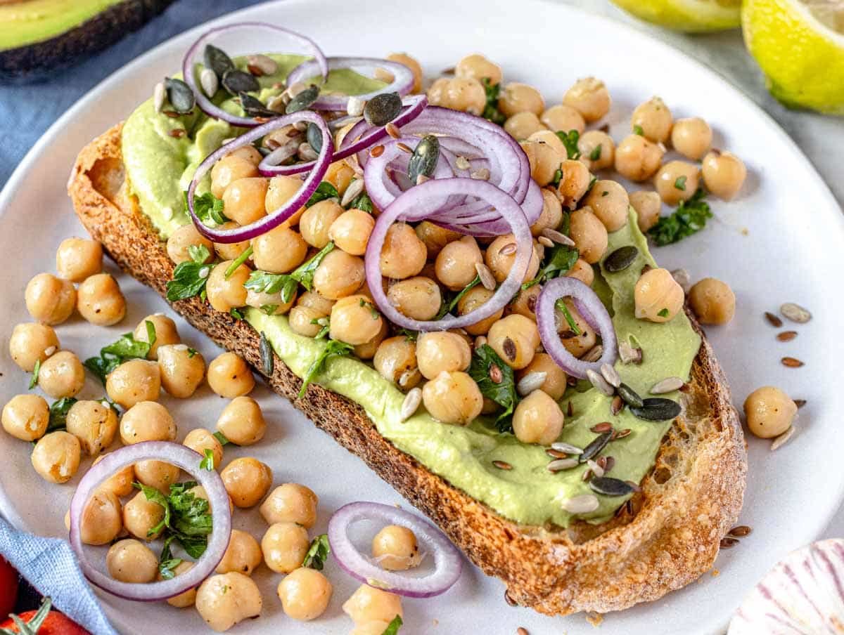 Avocado toast with chickpeas and red onion