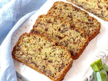 banana zucchini bread slices on a cutting board