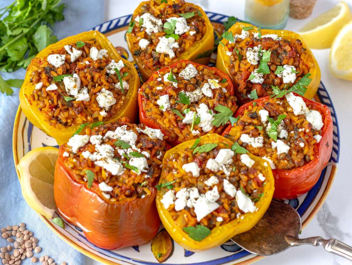 Step 3 Serving colorful bell peppers stuffed with spiced rice and topped with feta.