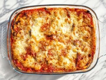 Step 5 Eggplant Parmigiana baked and resting before slicing.