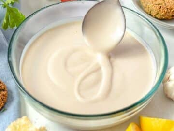 creamy tahini sauce in a glass bowl