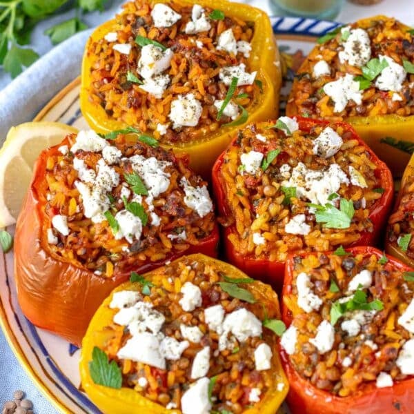 stuffed bell peppers with feta on a Mediterranean plate