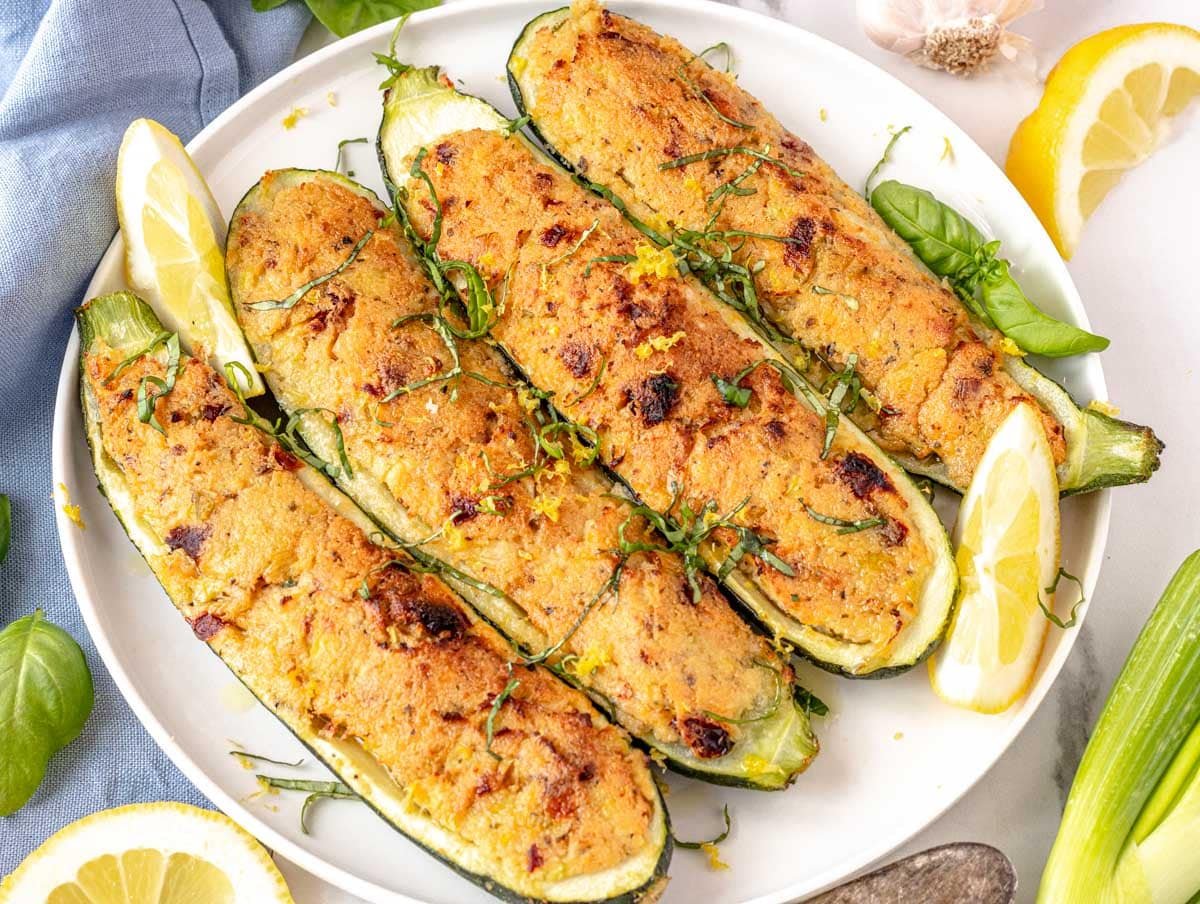 stuffed zucchini with ricotta on a white plate