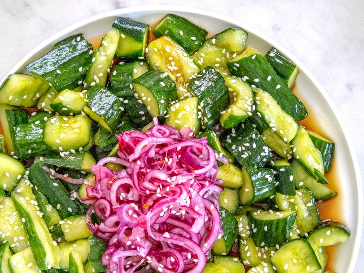 Asian cucumber salad with pickled onions and sesame seeds