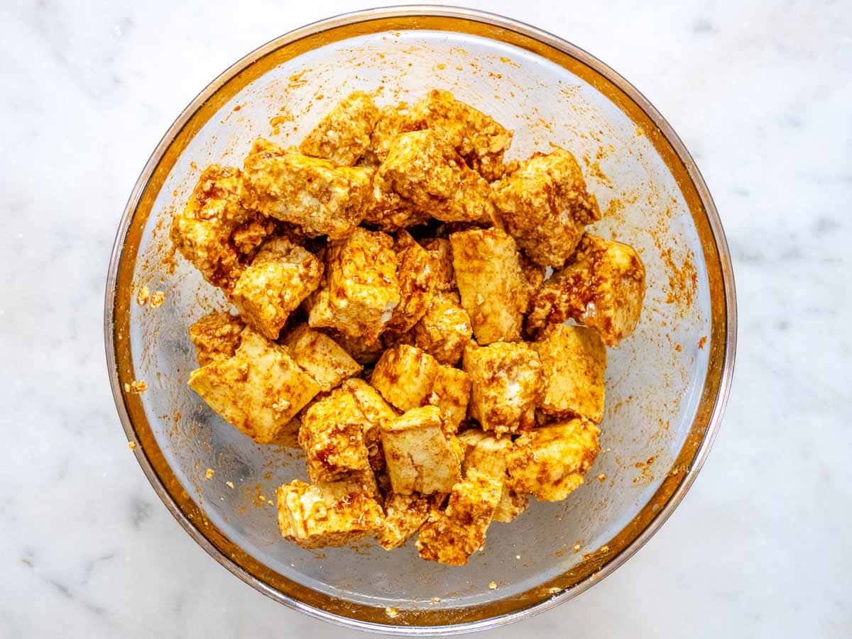 tofu pieces tossed in spices and oil
