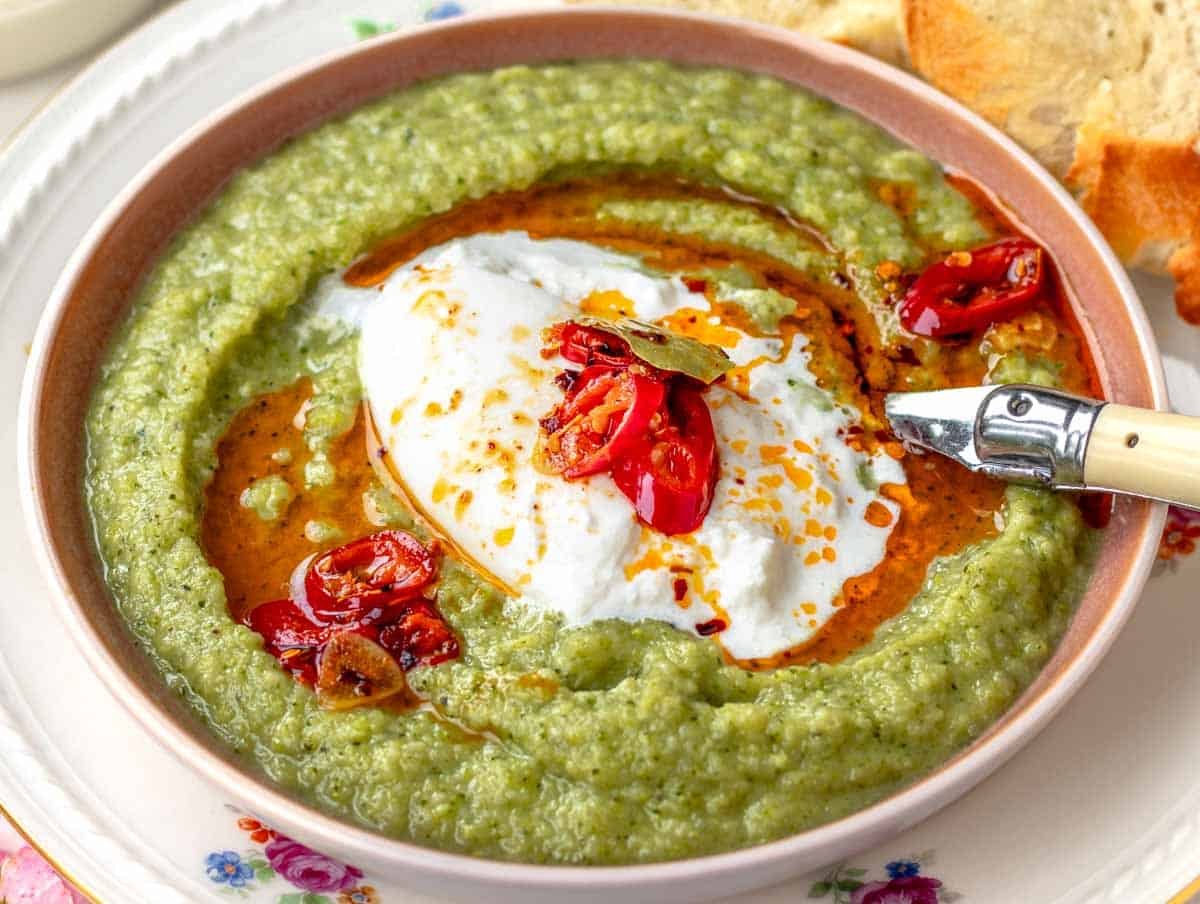 Broccoli Soup with burrata and a spoon