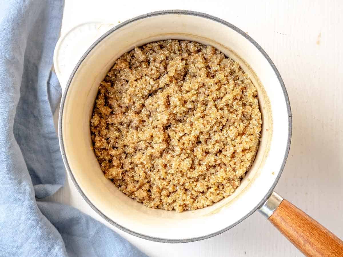 cooked quinoa in a white pot