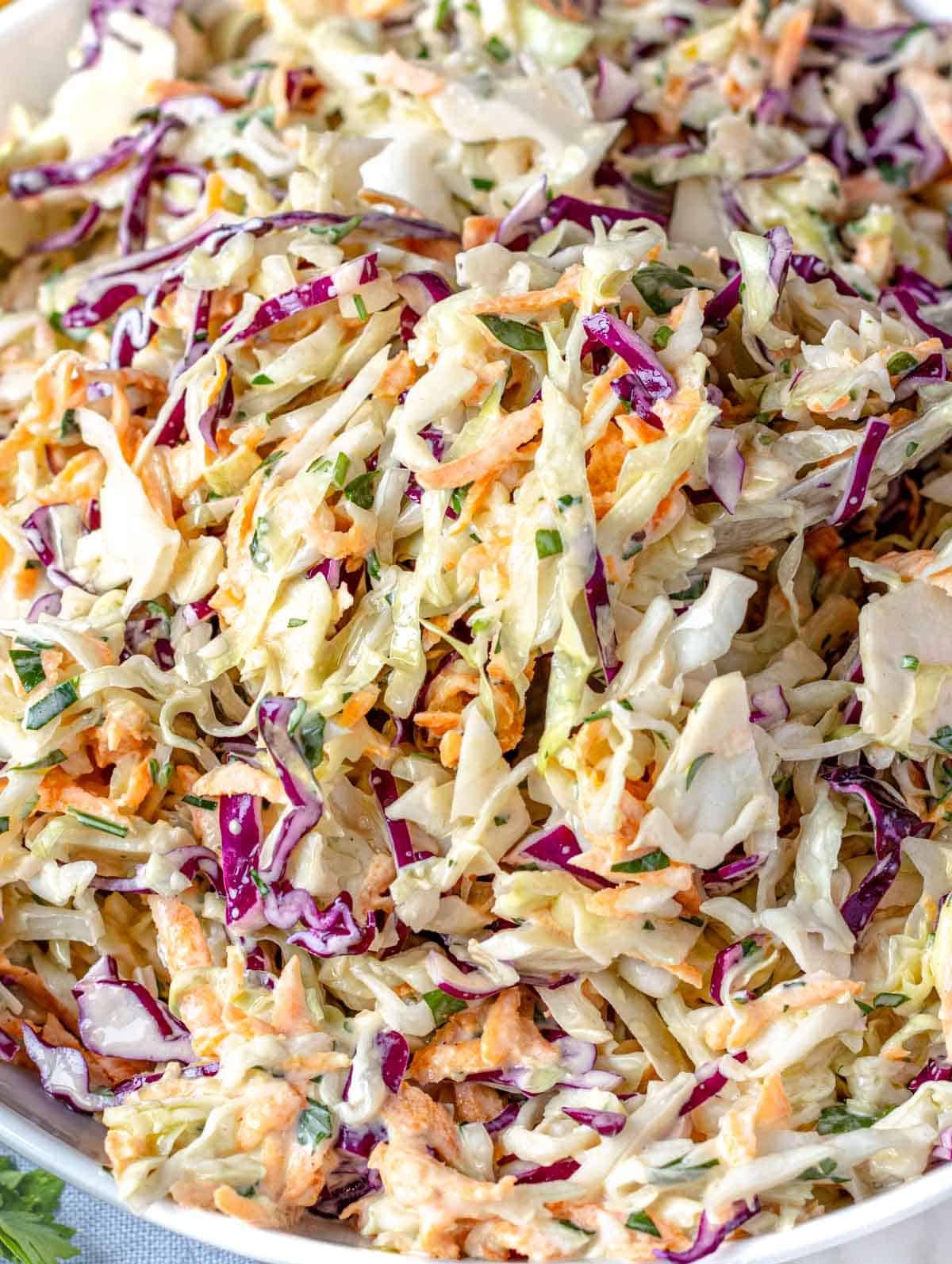 Coleslaw served in a white bowl