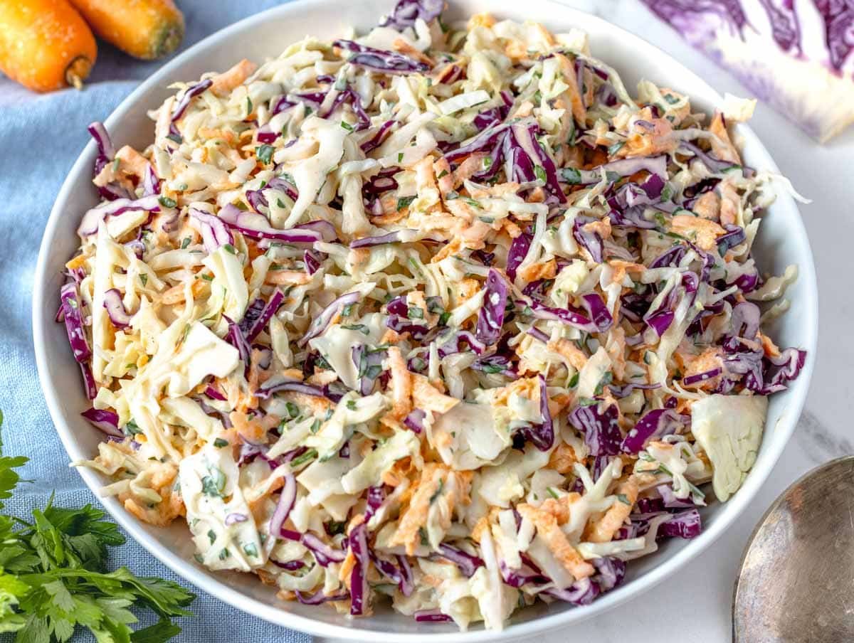 Coleslaw in a simple white bowl